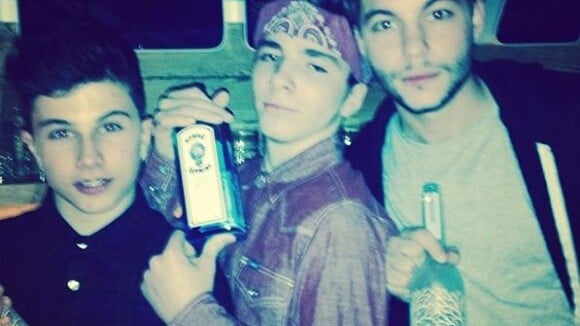 Madonna scandaleuse : Son fils Rocco, 13 ans, pose avec des bouteilles d'alcool