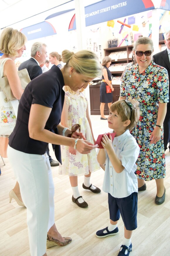 La comtesse Sophie de Wessex avec ses enfants Lady Louise et James au Coronation Festival à Buckingham le 11 juillet 2013