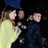 Marco Verratti et sa compagne, enceinte, Laura Zazzara lors du défilé Valentino automnehiver 2014-2015 à l'hôtel Salomon de Rothschild à Paris, le 15 janvier 2014