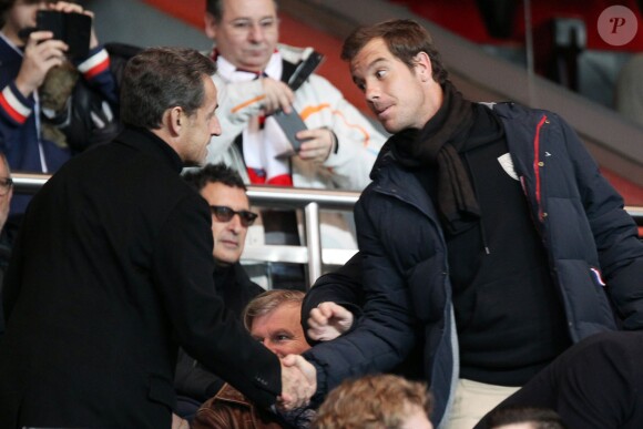 Nicolas Sarkozy et Richard Gasquet lors du match entre le Paris SG et Nantes au Parc des Princes le 19 janvier 2014 à Paris