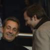 Nicolas Sarkozy et Eric Berdoati lors du match entre le Paris SG et Nantes au Parc des Princes le 19 janvier 2014 à Paris