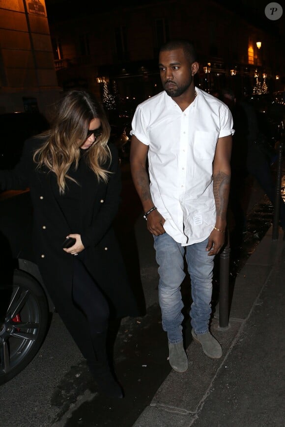 Apres être allé chercher Kim Kardashian à l'aéroport de Paris, Kanye West et sa fiancée sont allés dîner au restaurant Ferdi le 18 janvier 2014