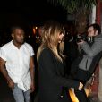 Apres être allé chercher Kim Kardashian à l'aéroport de Paris, Kanye West et sa fiancée sont allés dîner au restaurant Ferdi le 18 janvier 2014