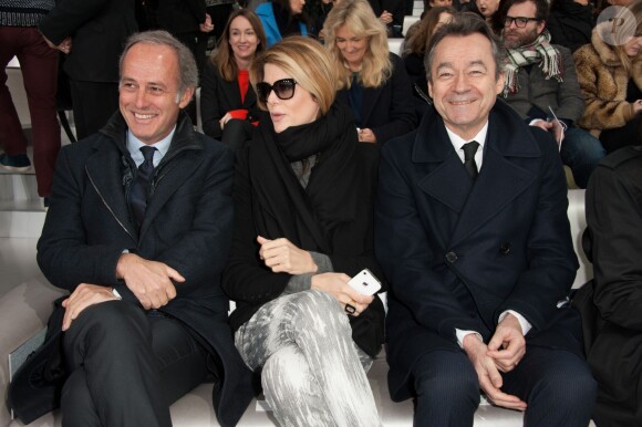 Xavier Romatet, le PDG de Condé Nast France, et Michel Denisot, assistent au défilé Chanel haute couture printemps-été 2014 au Grand Palais. Paris, le 21 janvier 2014.