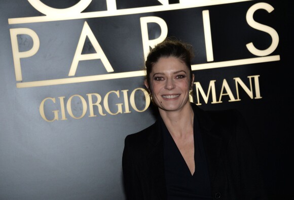 Chiara Mastroianni lors des arrivées au défilé haute couture printemps/été Giorgio Armani au Palais de Tokyo à Paris le 21 janvier 2014