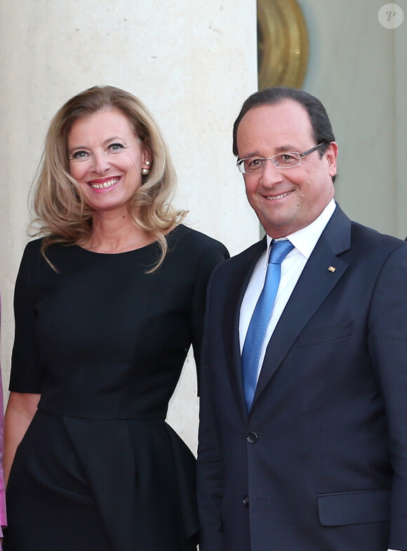 Valérie Trierweiler et François Hollande à l'Elysée le 3 septembre 2013 pour la réception du président allemand Joachim Gauck et son épouse.