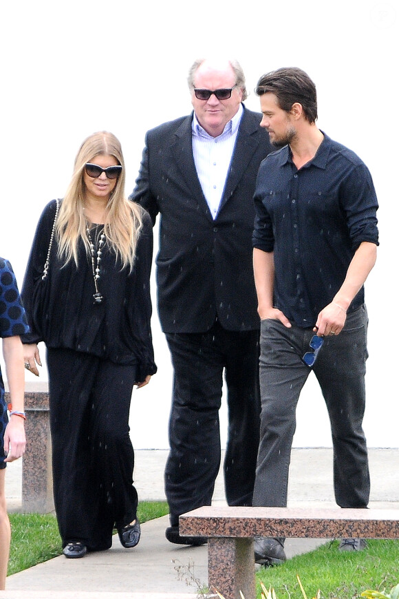 Fergie et son époux Josh Duhamel dans les rues de Los Angeles, le 26 janvier 2014.
