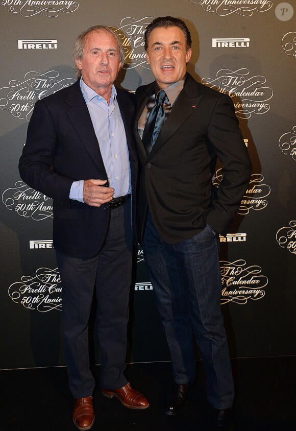 Jacques Laffite et Jean Alesi assistent à la soirée des 50 ans du calendrier Pirelli au Palais de Tokyo. Paris, le 30 janvier 2014.