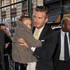 David Beckham et sa femme Victoria vont déjeuner au restaurant Balthazar avec leurs quatre enfants Brooklyn, Romeo, Cruz et Harper à New York, le 9 février 2014. La famille a assisté au défilé de Victoria un peu plus tôt dans la journée.