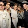 Fat Joe, French Montana, Jennifer Lopez, Loren Ridinger, Casper Smart lors de la soirée de lancement du Fat Joe's Market America UnFranchise Business à Miami Beach, le 8 février 2014.