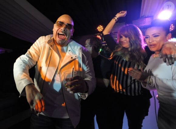 Fat Joe, Loren Ridinger et Lorena Cartagena lors de la soirée de lancement du Fat Joe's Market America UnFranchise Business à Miami Beach, le 8 février 2014.