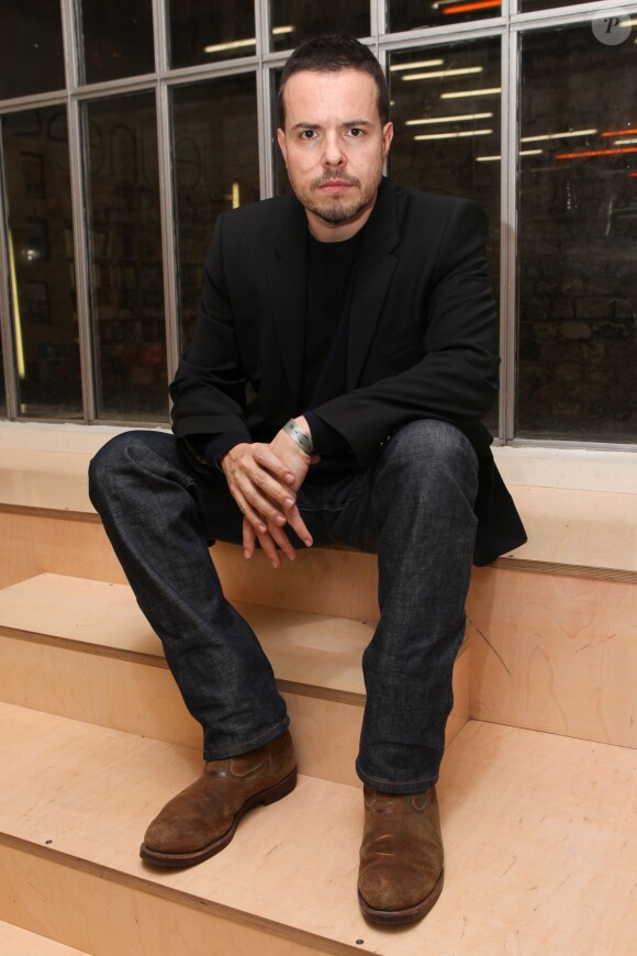 Exclusive - Nicolas Demorand pose pour les 40 ans de Libération au Cenquatre à Paris, le 13 décembre 2013
