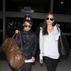 Angelina Jolie et son fils Maddox, trop stylé, arrivent au LAX à Los Angeles, le 14 février 2014.