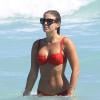 Natasha Oakley en bikini sur une plage de Miami le 14 février 2014