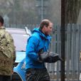  Le prince William prêtant main-forte à l'armée à Datchet dans le Berkshire, suite aux inondations, le 14 février 2014. 