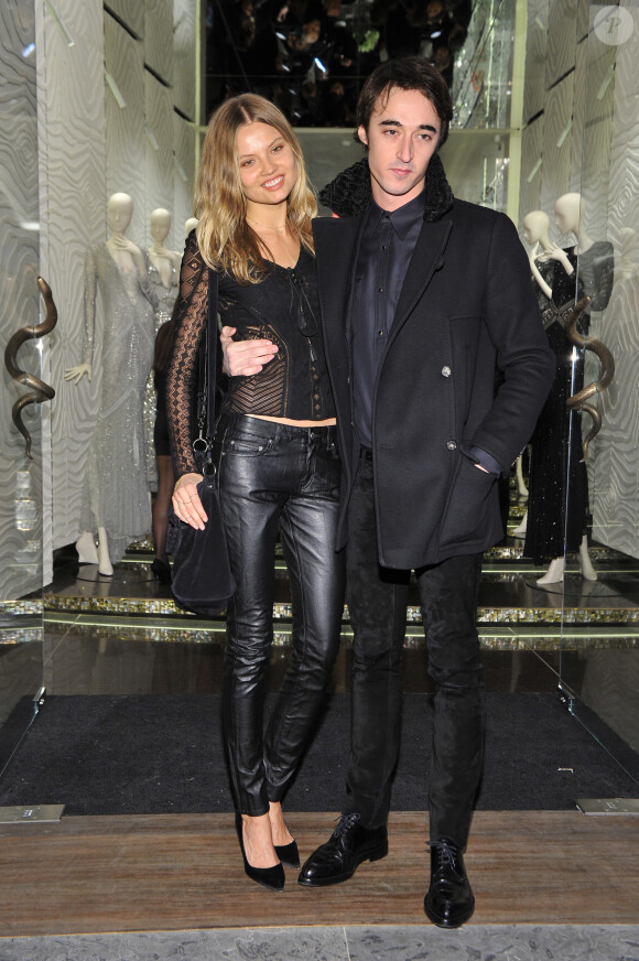Natasha Poly et Daniele Cavalli fêtent l'ouverture d'une nouvelle boutique Roberto Cavalli à Milan. Le 22 février 2014.