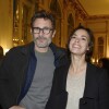 Michel Hazanavicius et sa femme Bérénice Bejo lorsque le cinéaste iranien Asghar Farhadi a été décoré Officier de l'ordre des Arts et des Lettres au ministère de la Culture à Paris le 27 février 2014