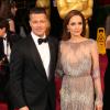 Angelina Jolie et Brad Pitt rayonnent à la 86e cérémonie des Oscars à Hollywood, le 2 mars 2014.