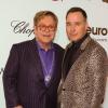 Elton John et son mari David Furnish à la "Elton John AIDS Foundation Viewing Party" à l'occasion de la 86e cérémonie des Oscars à Los Angeles, le 2 mars 2014.