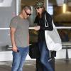 Stacy Keibler et Jared Pobre arrivent à l'aéroport de Los Angeles, le 7 décembre 2013.