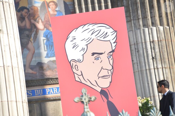 Les funérailles d'Alain Resnais en l'église Saint-Vincent-de-Paul à Paris le 10 mars 2014 : le portrait de Floc'h trône sur le parvis