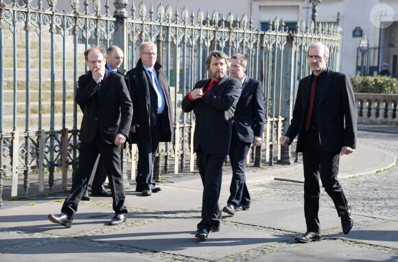 Bruno et Denis Podalydès, Mathieu Amalric, Michel Vuillermoz lors des funérailles d'Alain Resnais en l'église Saint-Vincent-de-Paul à Paris le 10 mars 2014