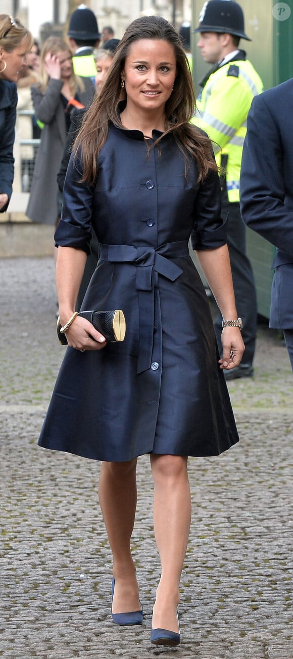 Pippa Middleton se rend à une messe en hommage à Sir David Frost à Westminster Abbey à Londres, le 13 mars 2014.