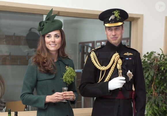 The Duke and Duchess of Cambridge during their visit to Mons Barracks in Aldershot, Hampshire, as the Irish Guards regiment marks St Patrick's Day in Aldershot, Hamphire, UK, on Monday March 17, 2014. Kate handed out the sprigs as the Duke of Cambridge, Colonel of the Irish Guards, watched the ceremony at the regiment's base Mons Barracks. Photo by Bradley Page/Daily Mail/PA Wire/ABACAPRESS.COM17/03/2014 - Aldershot