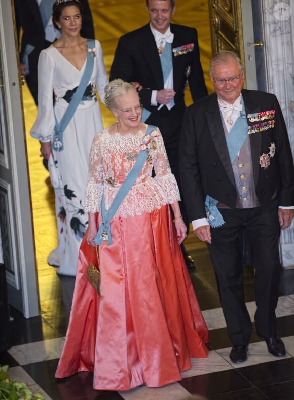 La reine Margrethe II de Danemark et le prince consort Henrik lors de la réception donnée le 12 mars 2014 au palais de Christiansborg pour les membres du gouvernement et parlementaires danois.