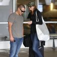 Stacy Keibler et son nouveau petit ami Jared Pobre arrivent à l'aéroport de Los Angeles, le 7 décembre 2013.