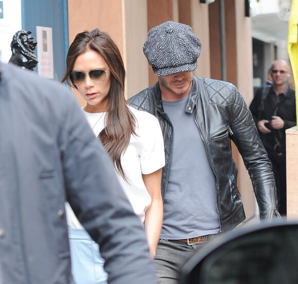 Exclusif - Victoria et David Beckham quittent l'emplacement de la future boutique de la créatrice, située sur Dover Street. Londres, le 20 mars 2014.