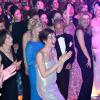 Charlotte Casiraghi parmi les convives qui ont pris d'assaut la piste de danse quand Mika a fait son show lors du Bal de la Rose le 29 mars 2014 à Monaco
