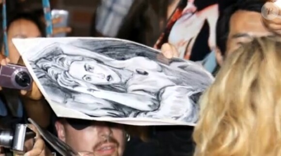 Le portrait qui hante encore Kate Winslet pendant la première de Divergente à Los Angeles le 18 mars 2014.