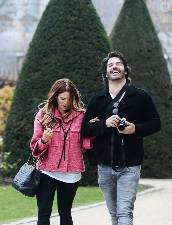 L'actrice Poppy Montgomery et Shawn Sanford à Paris, le 13 décembre 2013.
