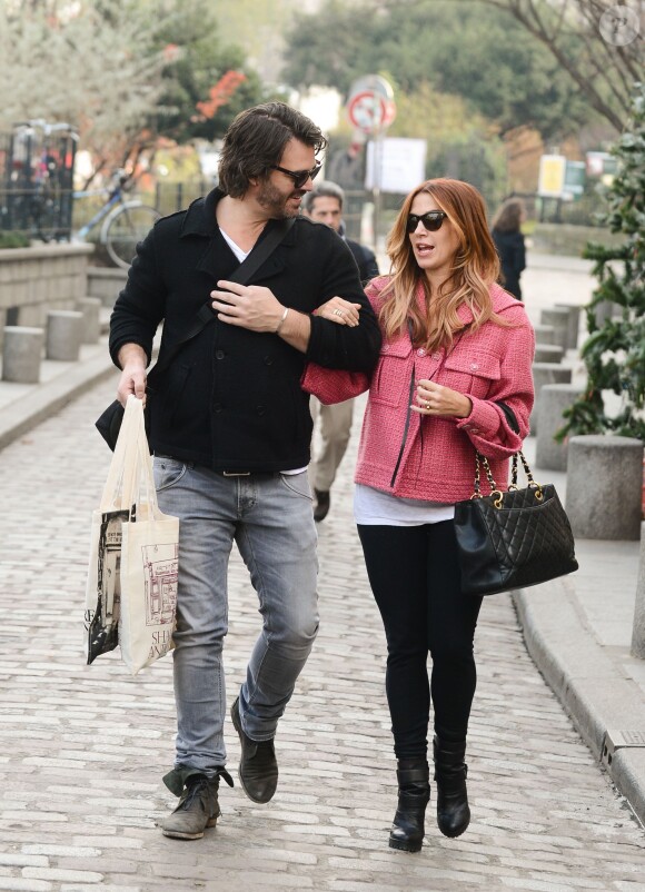 L'actrice Poppy Montgomery et Shawn Sanford à Paris, le 13 décembre 2013.
