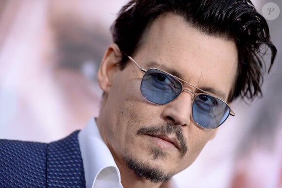 Johnny Depp lors de la première de Transcendence au Regency Village Theatre à Los Angeles, le 10 avril 2014.