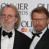 Benny Andersson et Bjorn Ulvaeus du grope ABBA lors de la cérémonie des Laurence Olivier Awards 2014 au Royal Opera House à Londres, le 13 avril 2014.