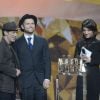 Miossec et David Ford recoivent le trophée de la Chanson originale pour "20 ans" de Johnny Hallyday - 29e édition des Victoires de la Musique à Paris. Le 14 février 2014.