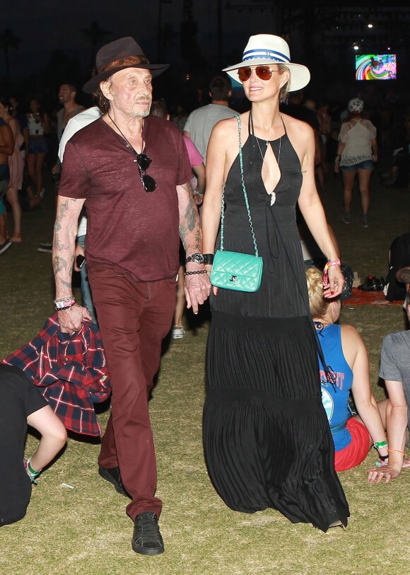 Johnny Hallyday et Laeticia Hallyday au 2e jour du 2e week-end du festival de musique de Coachella à Indio, le 19 avril 2014.