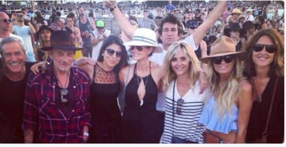 Johnny Hallyday, Laeticia Hallyday entourés d'amis dont Jean-Claude Darmon et sa compagne Hoda Roche au 2e jour du 2e week-end du festival de musique de Coachella à Indio, le 19 avril 2014.
