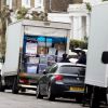 Des déménageurs sont vus au travail dans la propriété à Londres de Chris Martin et Gwyneth Paltrow, le 25 avril 2014