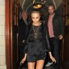 Cara Delevingne quitte son hôtel pour se rendre au dîner Kate Moss pour Topshop. Londres, le 29 avril 2014.