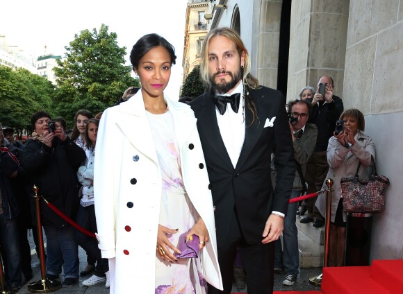 Zoe Saldana et son mari Marco Perego arrivent à la soirée "Global Gift Gala 2014" à l'hôtel Four Seasons George V à Paris, le 12 mai 2014.