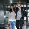Zoe Saldana et son mari Marco Perego vont prendre un avion à l'aéroport JFK de New York, le 9 mai 2014.