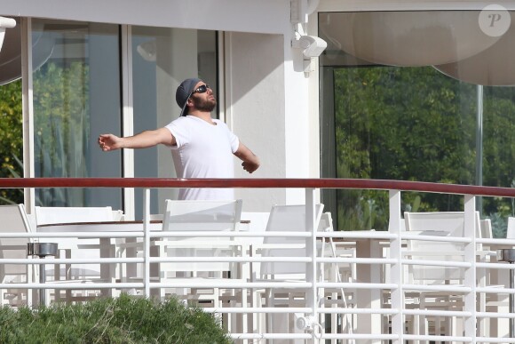 Pamela Anderson et son mari Rick Salomon sont descendus à l'hôtel Eden Roc au Cap d'Antibes, le 13 mai 2014. Le couple est venu pour participer au 67e Festival du Film de Cannes.