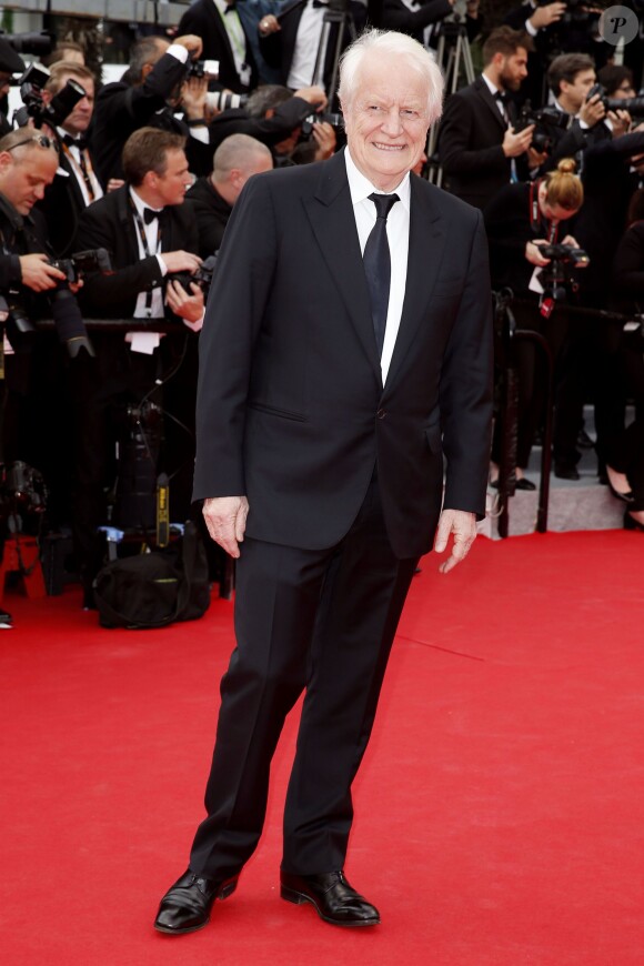 André Dussollier lors de la montée des marches de la cérémonie d'ouverture et la projection du film Grace de Monaco, au Festival de Cannes, le 14 mai 2014