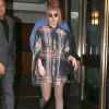 Lady Gaga et son compagnon Taylor Kinney quittent leur hôtel à New York. La chanteuse s'est prêtée au jeu des photos et dédicaces avec ses fans qui l'attendaient à l'extérieur. Le 15 mai 2014.