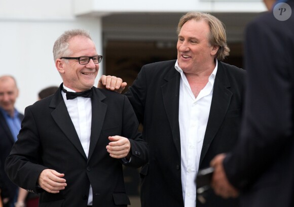 Thierry Frémaux et Gérard Depardieu lors de l'hommage au cinéma d'animation lors du 67e festival du film de Cannes le 17 mai 2014.