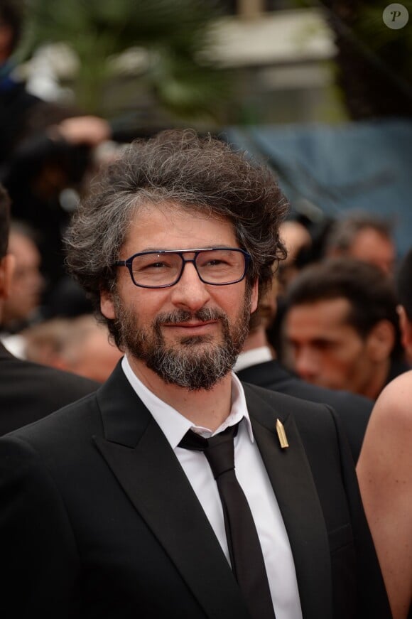 Radu Mihaileanu à la montée des marches de Foxcatcher, à l'occasion du 67e Festival de Cannes, le 19 mai 2014.