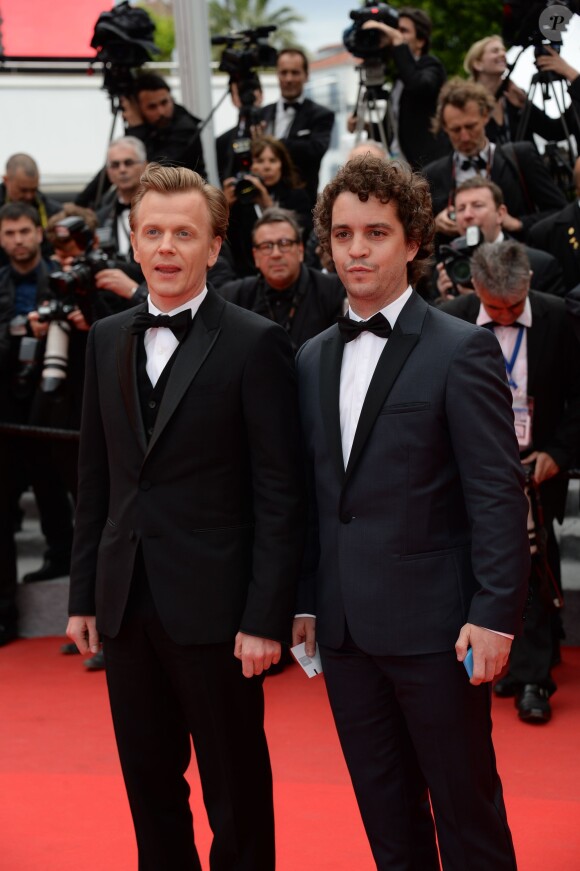 Alex Lutz et Bruno Sanches à la montée des marches de Foxcatcher, à l'occasion du 67e Festival de Cannes, le 19 mai 2014.